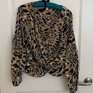 Small Women’s animal print blouse with the V-neck